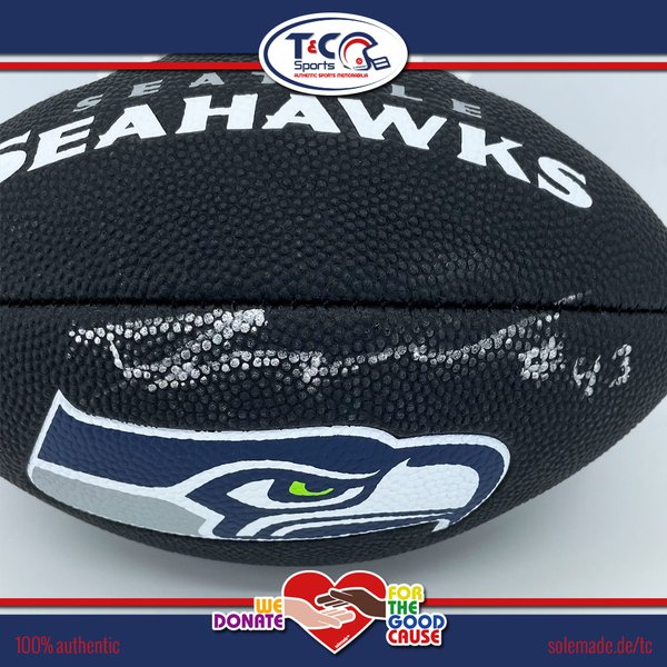 0076242 - Aaron Donkor signed black Seattle Seahawks Wilson Mini-Football